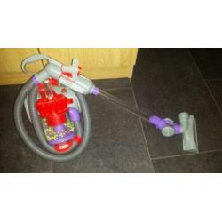 Kinder stofzuiger merk Dyson +houten blokjes in wagentje