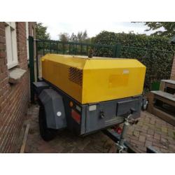Compressor met aggregaat