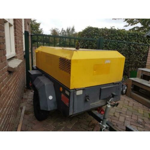 Compressor met aggregaat