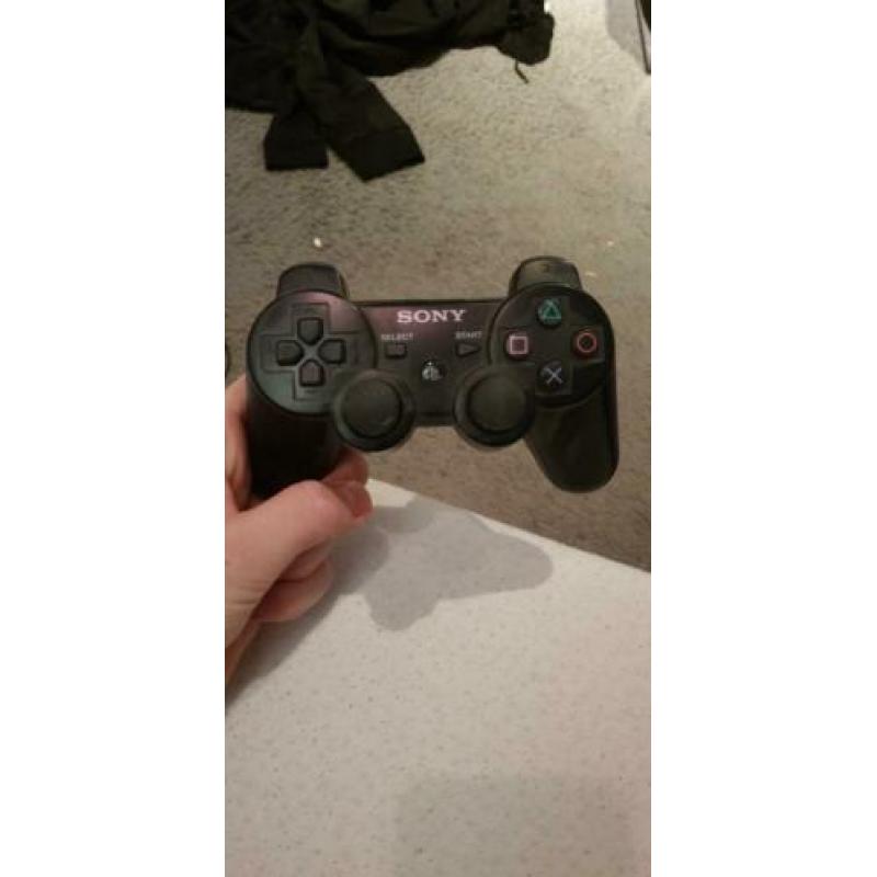 PlayStation 3 met 18 spellen en veel assecoires