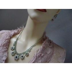 Fraaie j.80 set: ketting en oorbellen van facetgesl.kristal