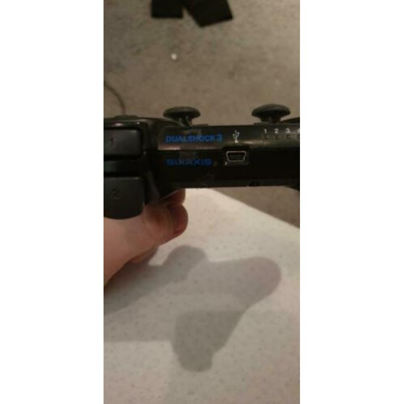 PlayStation 3 met 18 spellen en veel assecoires