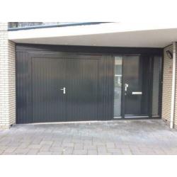 Openslaande houten garagedeuren uit Den Ham