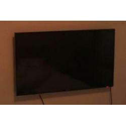 Samsung UHD Smart TV 40 inch, evt. met soundbar en subwoofer