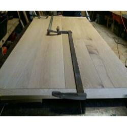 eiken eetkamertafel met stalen onderstel eikenhout