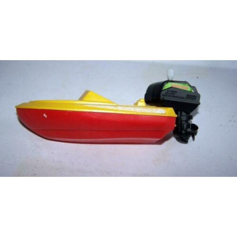Mooie vintage speedboat met opwindbaar motortje. Igs.