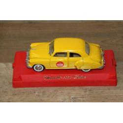 12 = Coca Cola Chevrolet 1950 Sedan.
