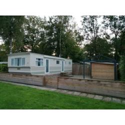 Tekoop stacaravan met dubbelglas op camping Ponderosa