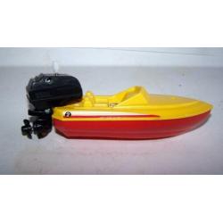 Mooie vintage speedboat met opwindbaar motortje. Igs.