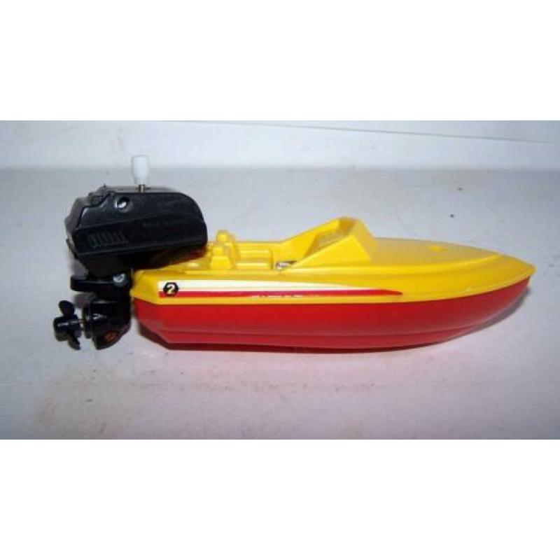 Mooie vintage speedboat met opwindbaar motortje. Igs.