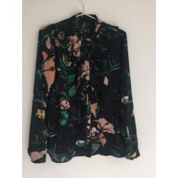 Feestelijke blouse met roesjeskraag