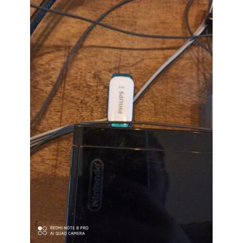 Nintendo Wii met vele toebehoren. Power adapter mist!