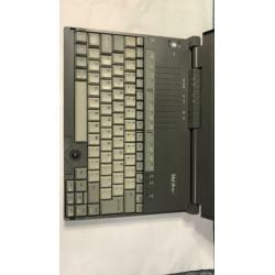 Tulip laptop nb 486SX serie no. QC 3259049A (30x22x4)