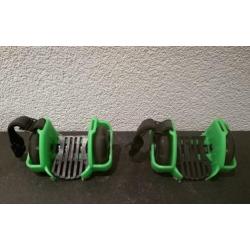 Flashing Rollers in de kleuren zwart en groen.