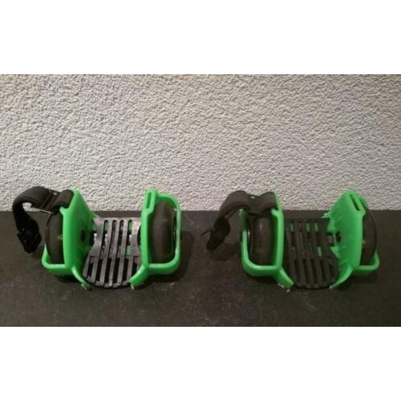 Flashing Rollers in de kleuren zwart en groen.