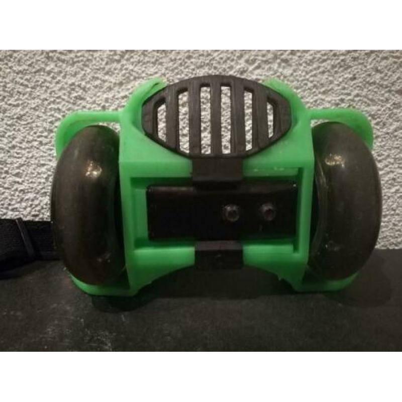 Flashing Rollers in de kleuren zwart en groen.
