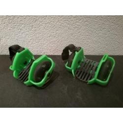 Flashing Rollers in de kleuren zwart en groen.