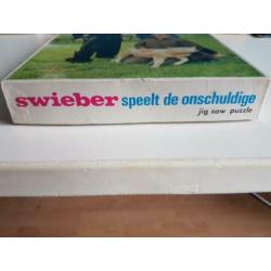 facet puzzle jig saw, Swieber speelt de onschuldige