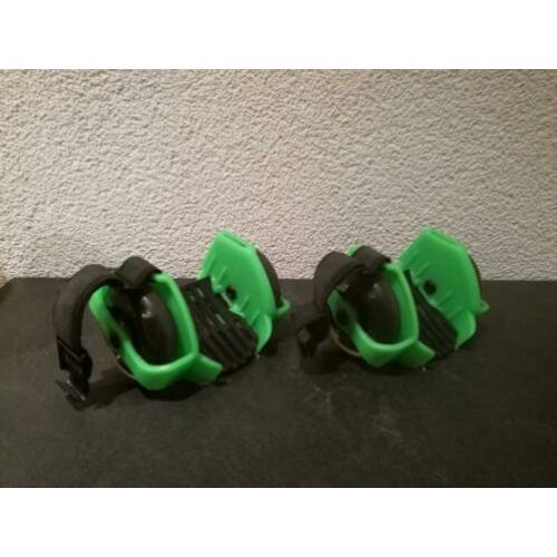 Flashing Rollers in de kleuren zwart en groen.
