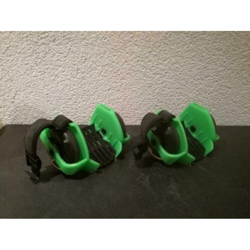 Flashing Rollers in de kleuren zwart en groen.