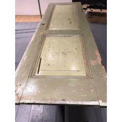 Tafel van oude deur met stalen onderframe 2 stuks €100,- pst