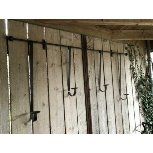 Wand kandelaar +/- 2 meter breed 30 euro