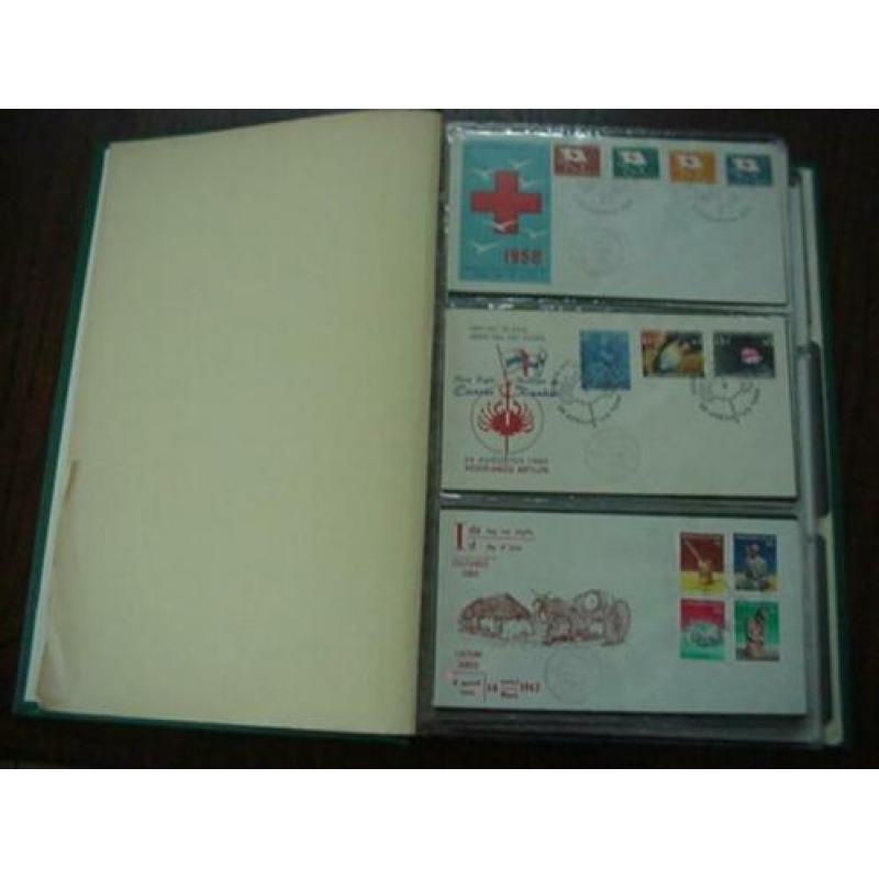 127 FDC's van de Nederlandse Antillen in een groen FDC-album
