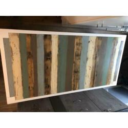 Design eettafel gemaakt van epoxy sloophout