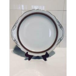 Porcelaine bord uit Frankrijk