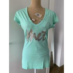 Leuk Shirt MET maat L met V-hals lichtgroen