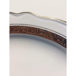 Porcelaine bord uit Frankrijk