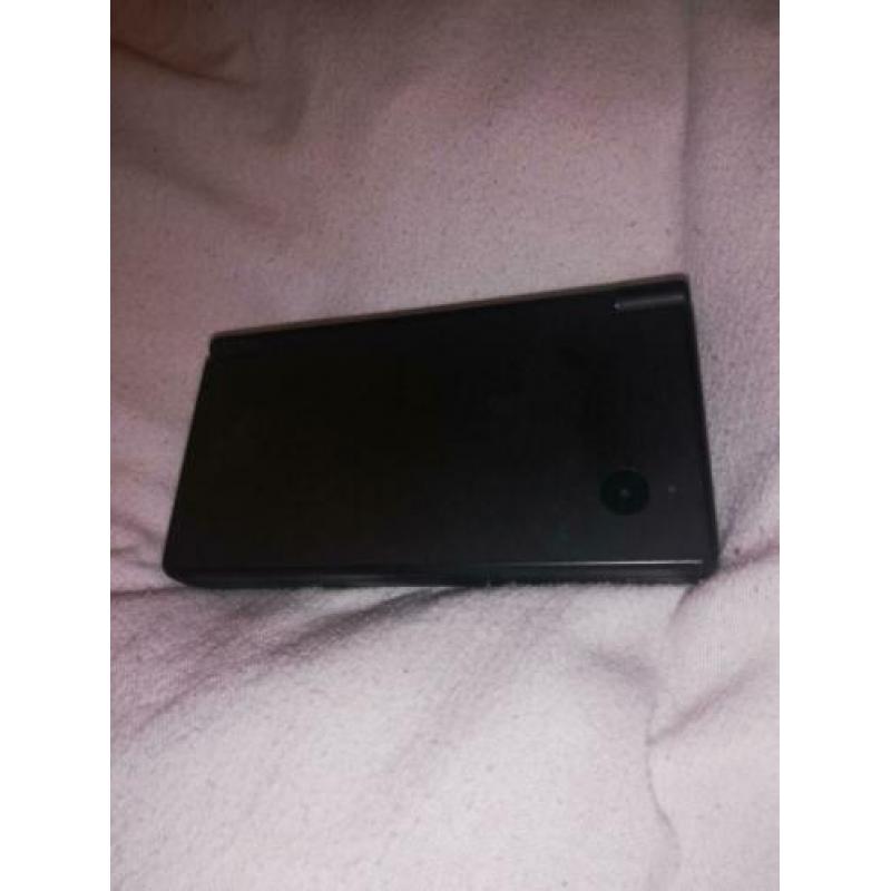 Nintendo DSi compleet met hoes, pinnetje, spellen, oplader