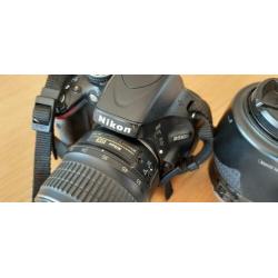 Nikon D5100 met 2 lenzen 18-55 en 55-200