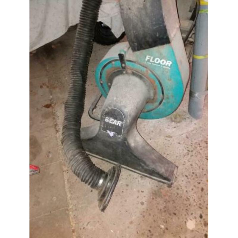 Werkende zuigmachine