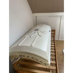 Zonnebank/hemel met bed