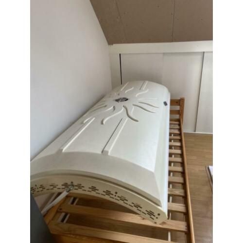 Zonnebank/hemel met bed
