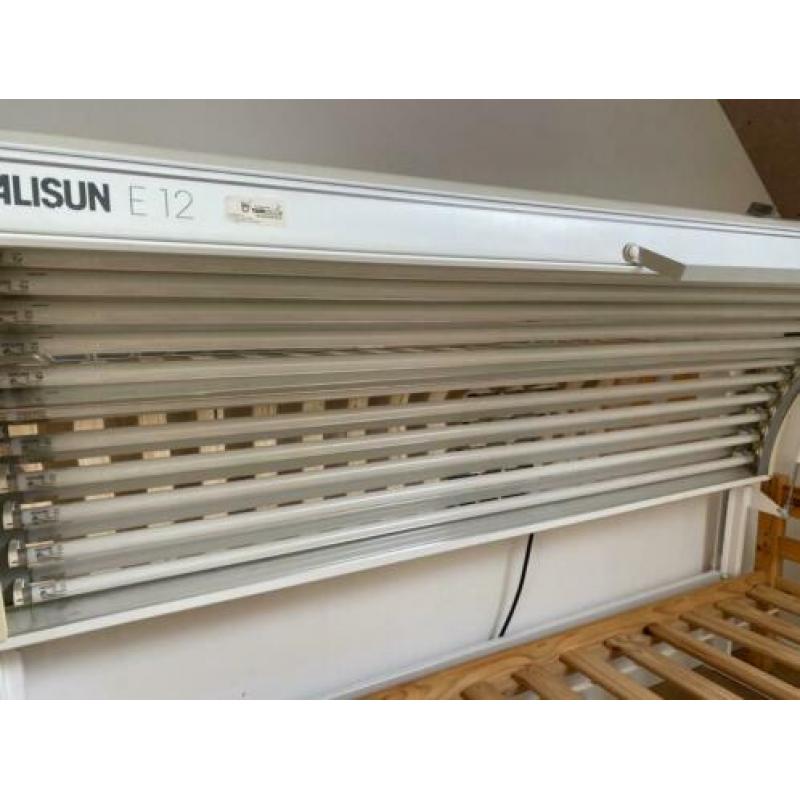Zonnebank/hemel met bed