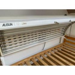 Zonnebank/hemel met bed