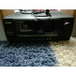 Te koop nette radio tuner van Aiwa met afstandsbediening