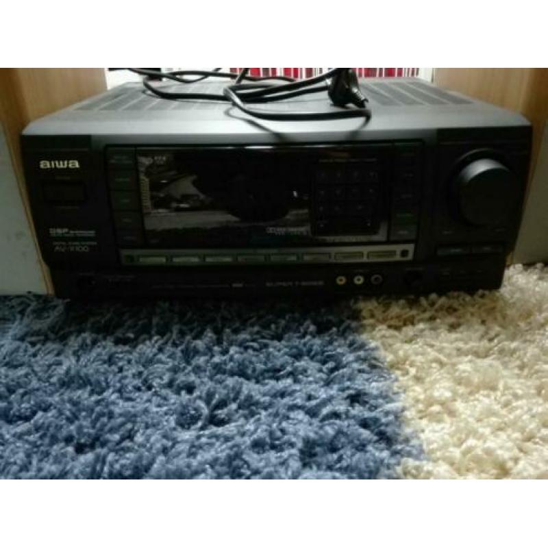 Te koop nette radio tuner van Aiwa met afstandsbediening