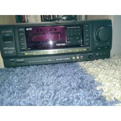 Te koop nette radio tuner van Aiwa met afstandsbediening