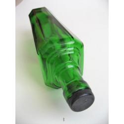 Oude groene art deco fles vlekkenwater