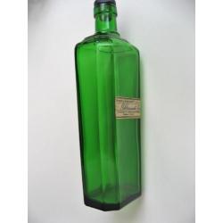 Oude groene art deco fles vlekkenwater