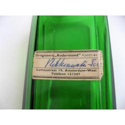 Oude groene art deco fles vlekkenwater