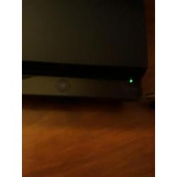 PlayStation 3+spellen+lader en controllers.