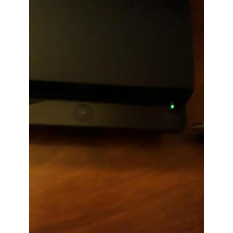 PlayStation 3+spellen+lader en controllers.