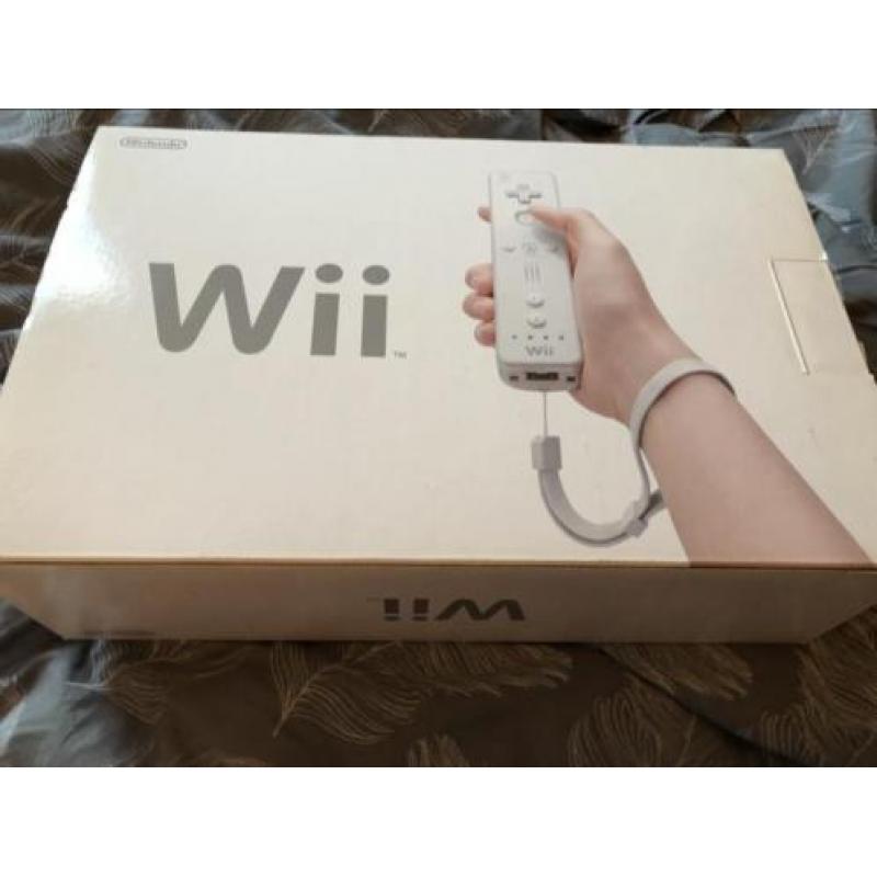 Nintendo Wii, 4 games, 2 contollers, balanceboard, en meer